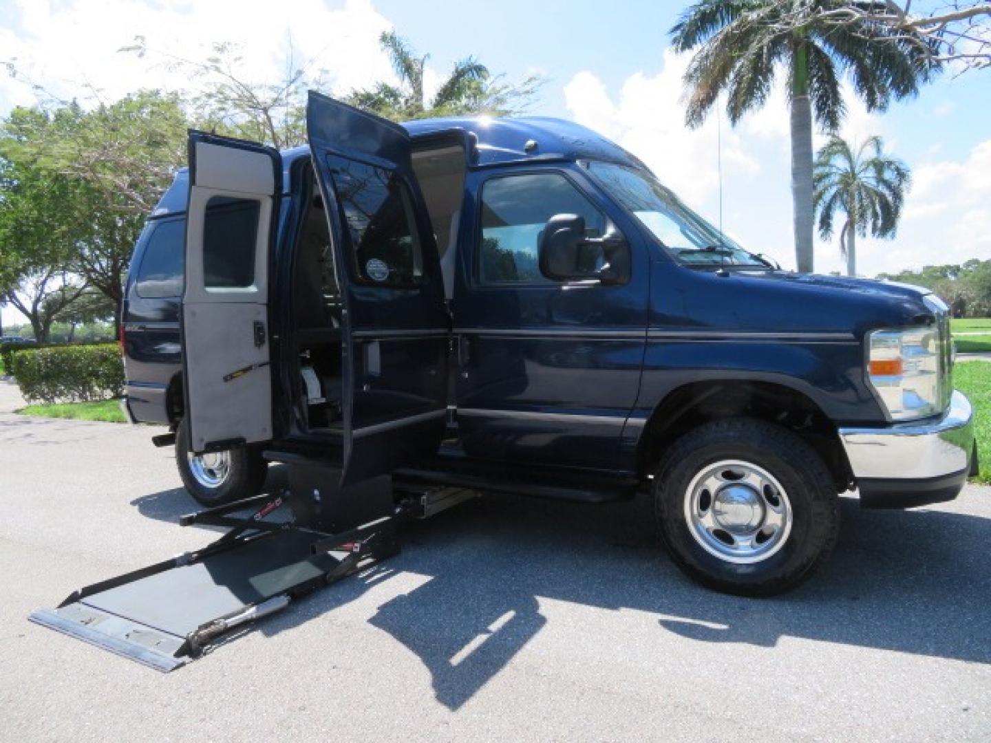 2011 Dark Blue /Gray Ford E-Series Wagon E-350 XLT Super Duty (1FBNE3BS4BD) with an 6.8L V10 SOHC 20V engine, located at 4301 Oak Circle #19, Boca Raton, FL, 33431, (954) 561-2499, 26.388861, -80.084038 - You are looking at a Gorgeous 2011 Ford Econoline E350 XLT Norcal Max High Top Handicap Wheelchair Conversion Van with 6.8L V10, 15K Original Miles, 9 Inch Lowered Floor, Braun UVL Side Entry Wheelchair Lift, Remote Control Power Side Entry Doors, Expanded Side Entry Doors, Q Straint Tie Down, Syste - Photo#44